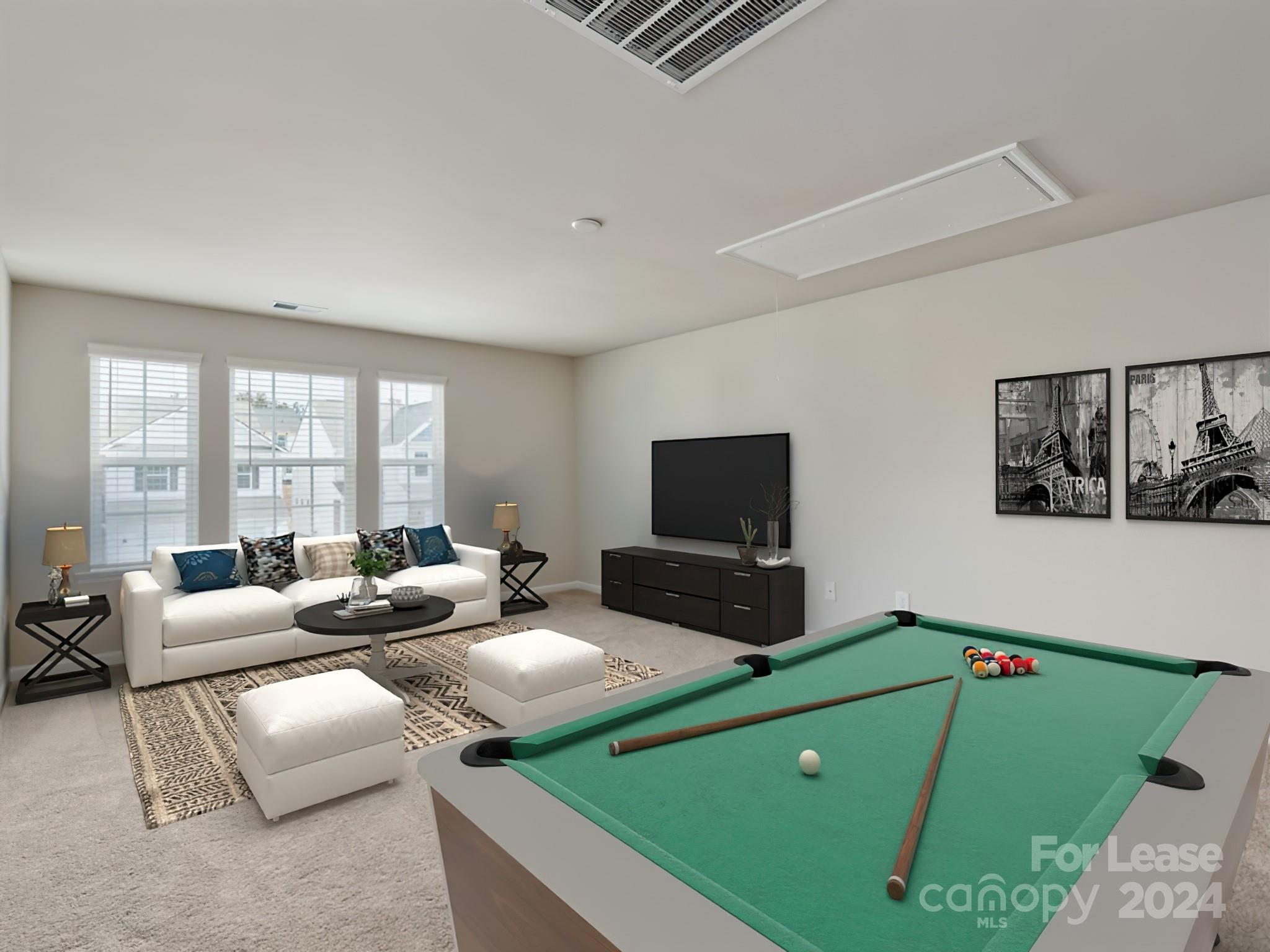 6531 Gopher Road Lancaster, SC 29720 - Photo 15 of 27 a living room with furniture and a flat screen tv
