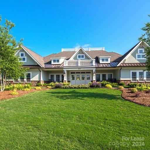 6531 Gopher Road Lancaster, SC 29720 - Photo 22 of 27 a front view of a house with garden and porch
