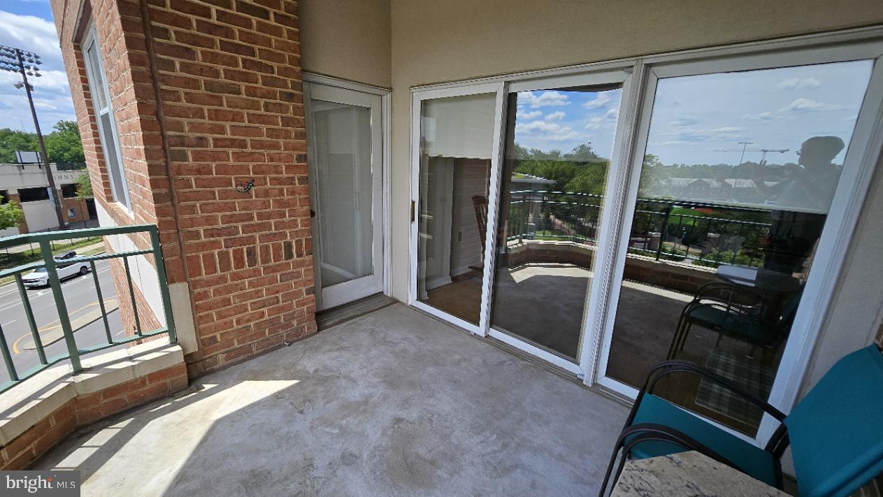 3801 Canterbury Road, Unit 409 Baltimore, MD 21218 - Photo 21 of 31 Spacious balcony with scenic views.