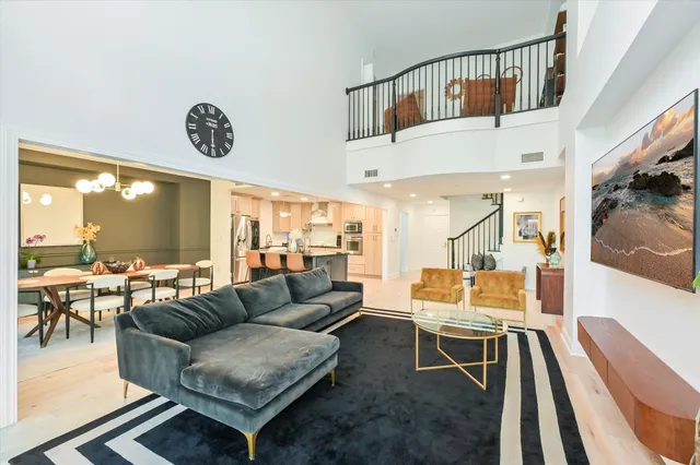 a living room with furniture and a table