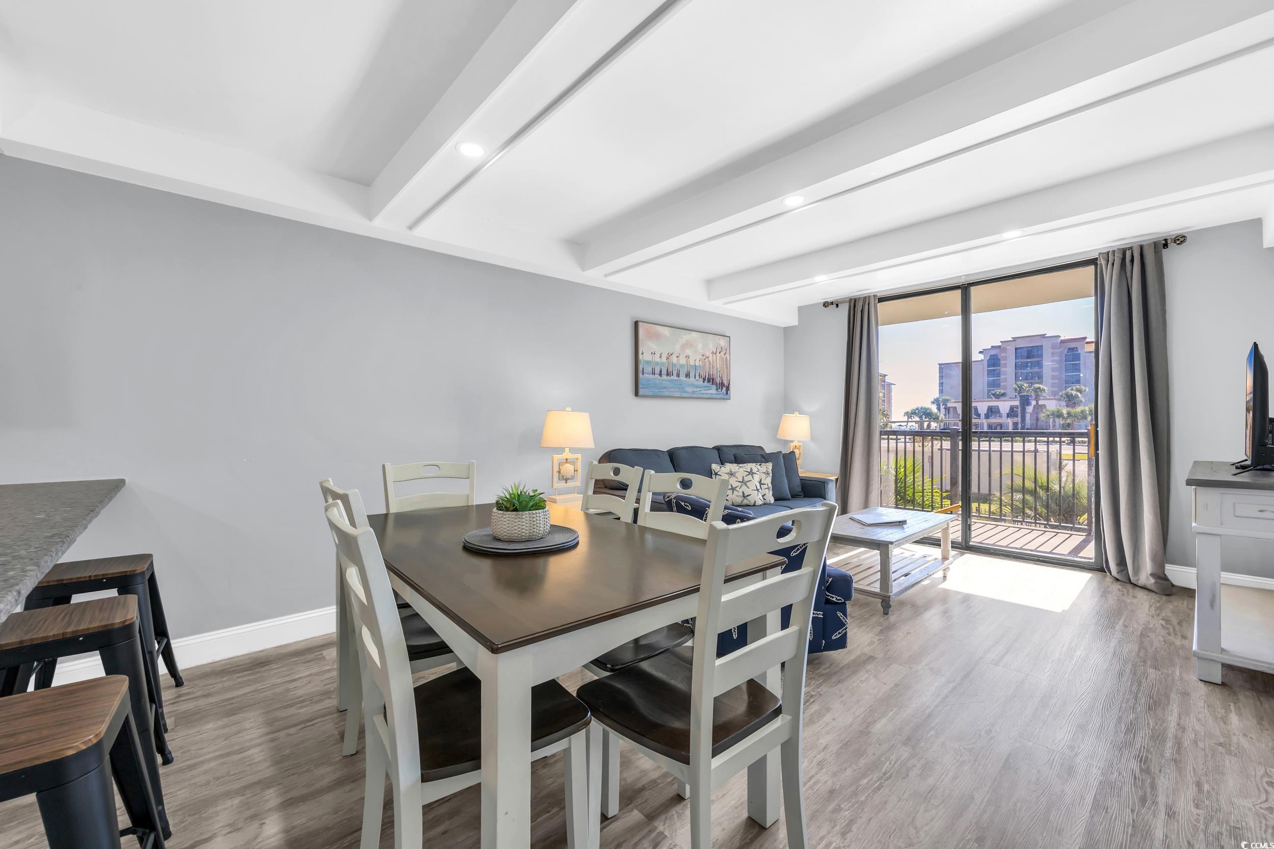 601 Mitchell Drive, Unit 203 Myrtle Beach, SC 29577 - Photo 13 of 40 Dining room featuring beamed ceiling, light wood-type flooring, and recessed lighting