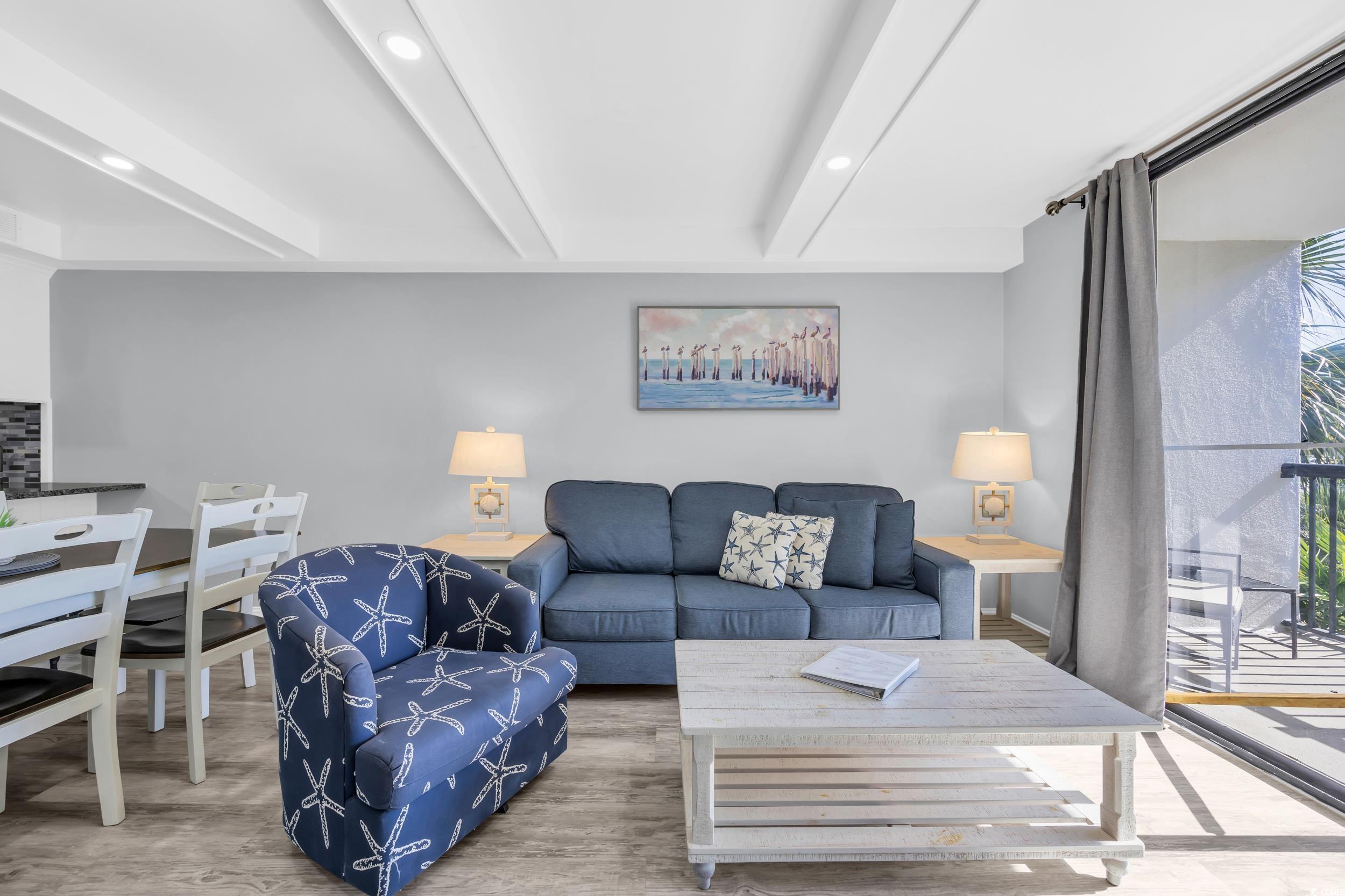 601 Mitchell Drive, Unit 203 Myrtle Beach, SC 29577 - Photo 18 of 40 Living room featuring recessed lighting, beamed ceiling, and wood finished floors