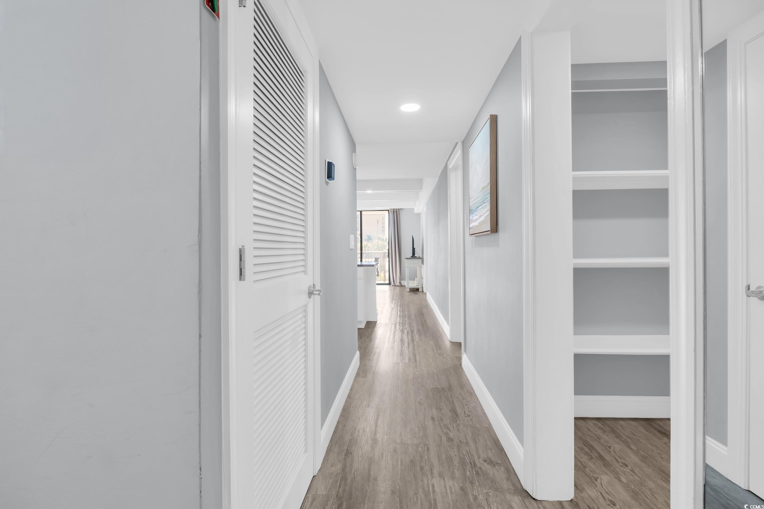 601 Mitchell Drive, Unit 203 Myrtle Beach, SC 29577 - Photo 4 of 40 Hallway featuring light wood-style flooring and recessed lighting