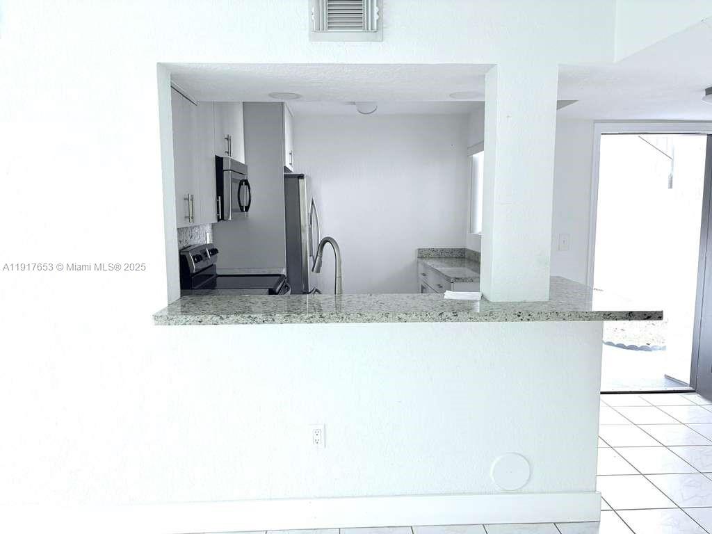 1175 Northwest 124 Place, Unit 101 Miami, FL 33182 - Photo 3 of 14