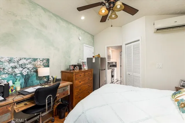 a bed room with a bed and furniture