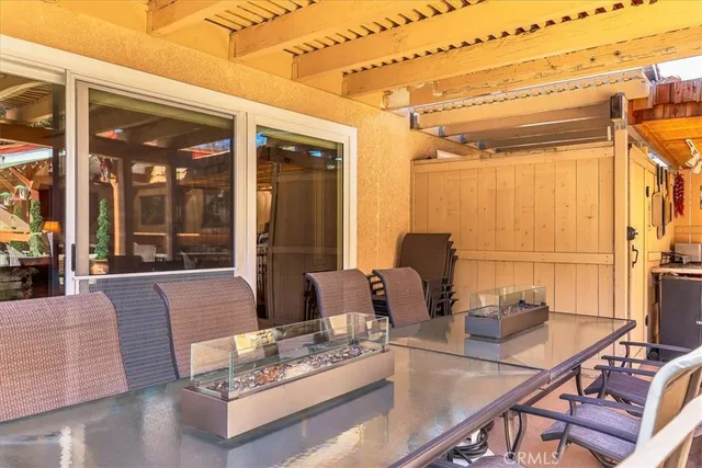 a utility room with multiple dryer and washer
