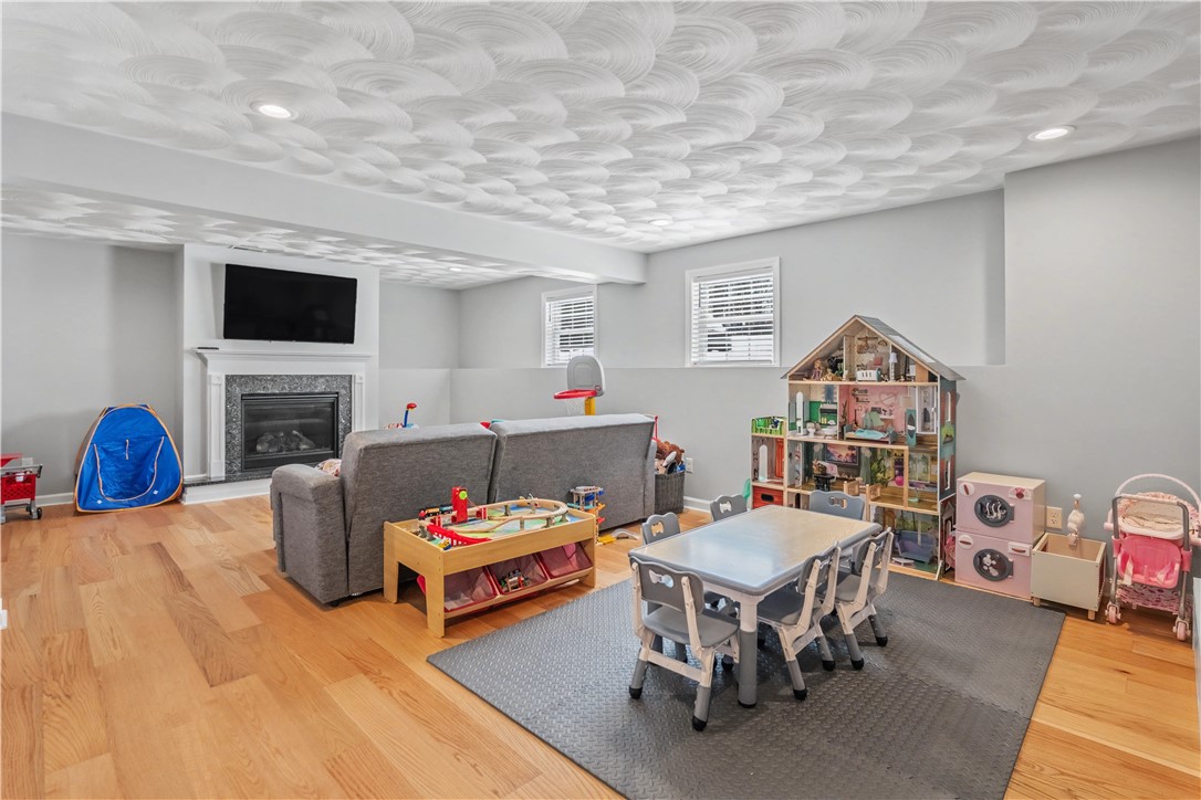 100 Franklin Road Scituate, RI 02825 - Photo 30 of 37 Rec Room with gas FP / Playroom