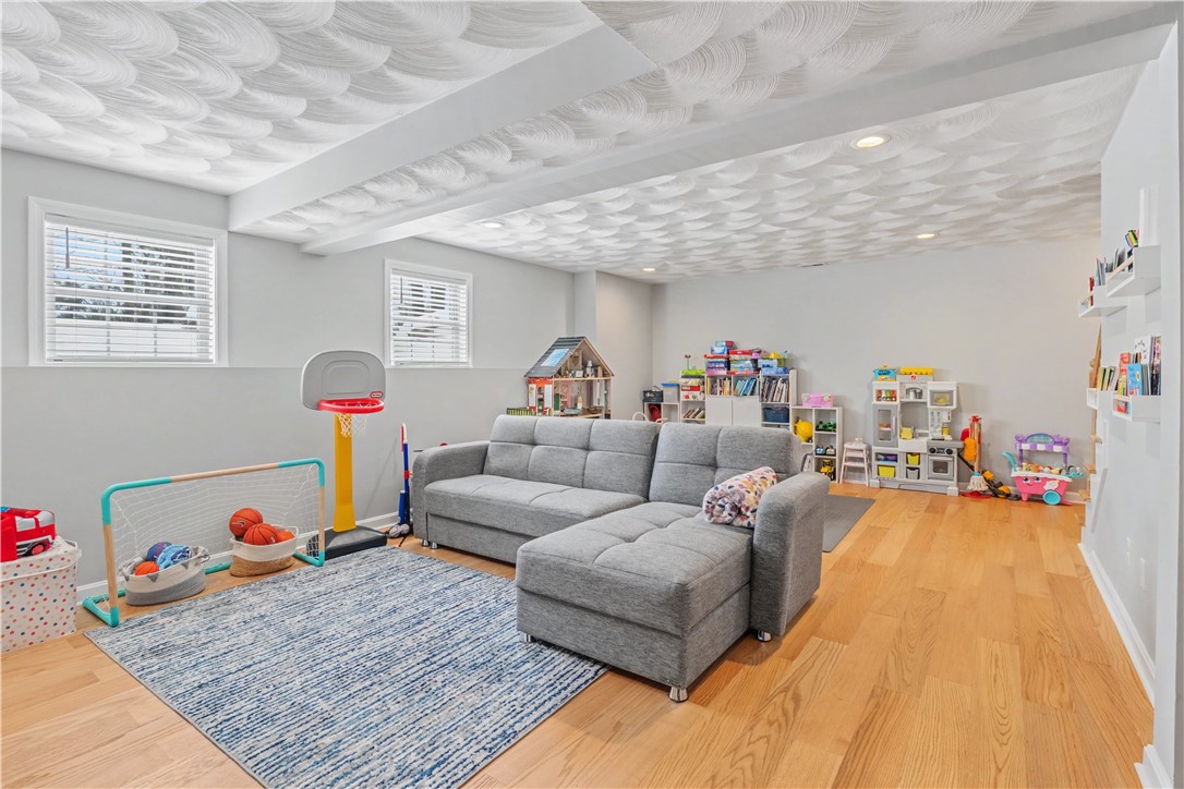 100 Franklin Road Scituate, RI 02825 - Photo 32 of 37 Rec Room with gas FP / Playroom