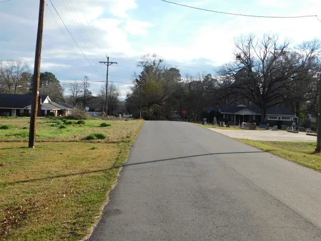 a view of swimming pool with a yard