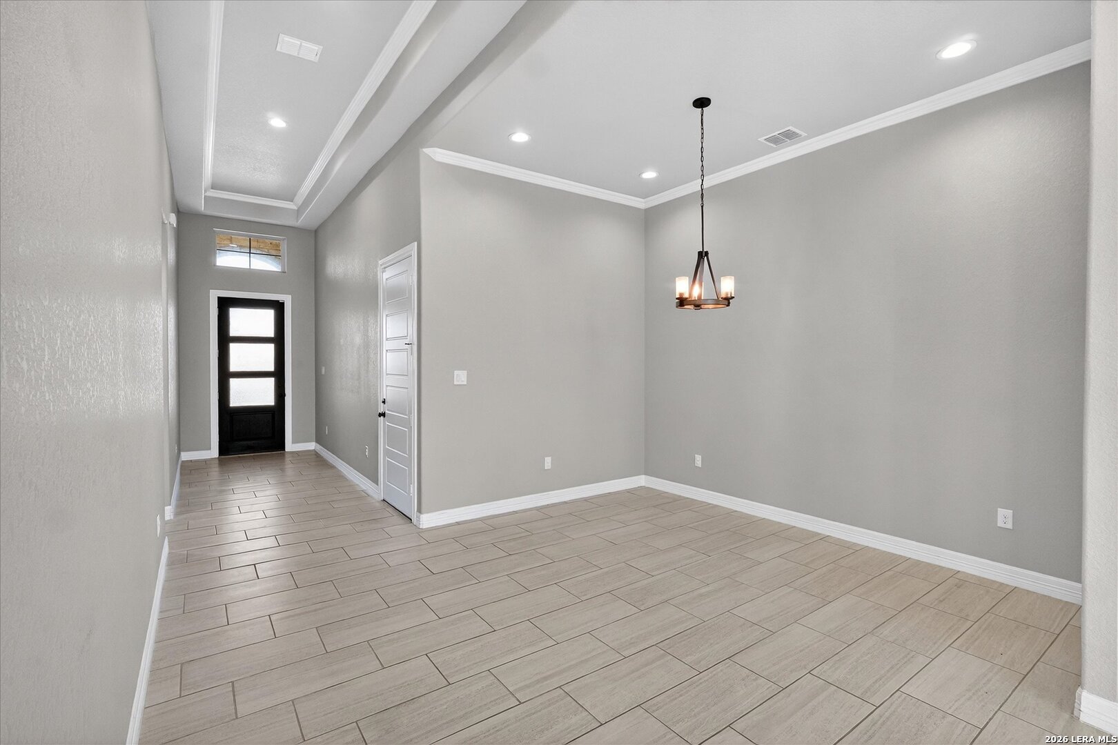 132 West Medium Meadow Drive Lytle, TX 78052 - Photo 19 of 40 a view of a hallway with wooden floor