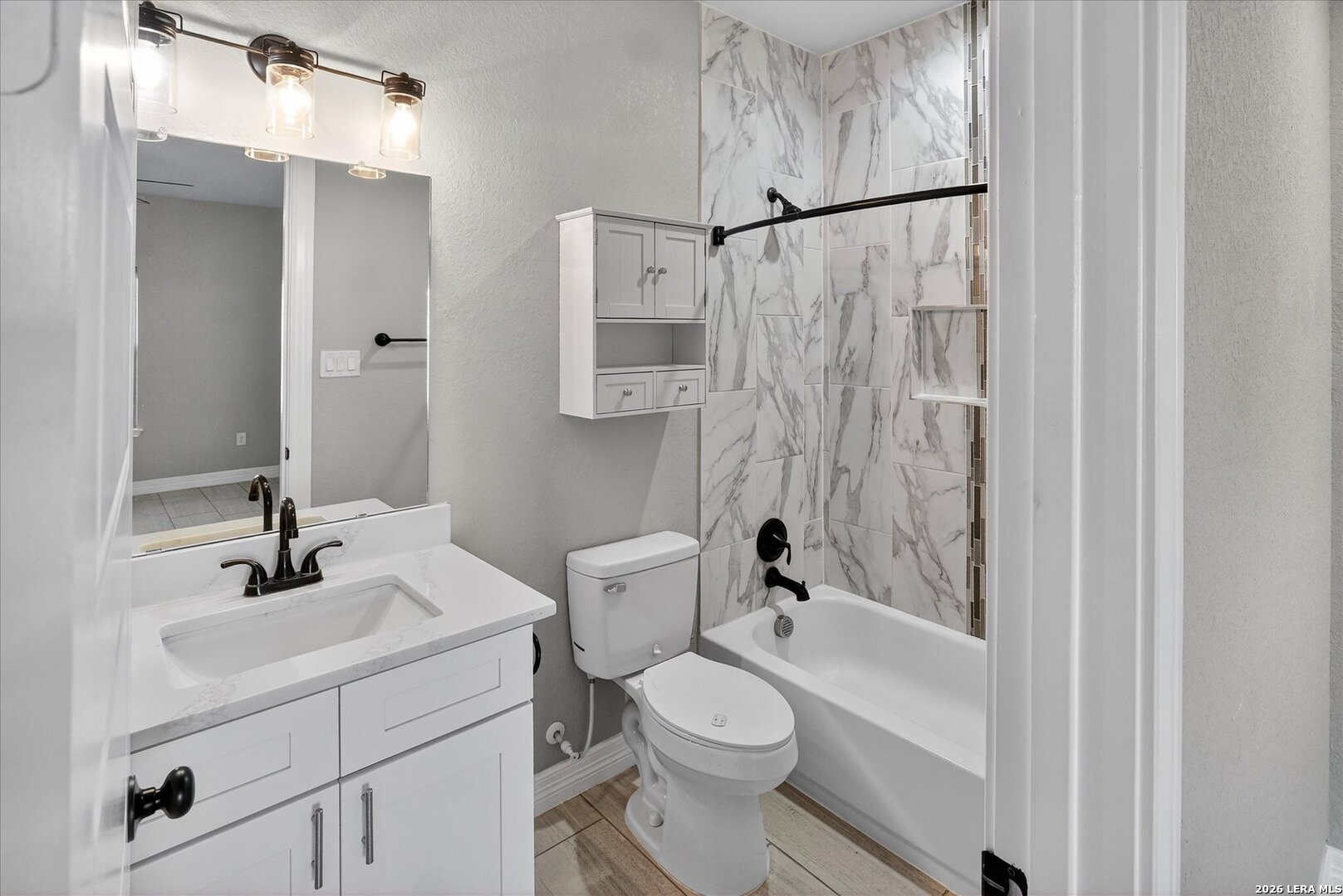 132 West Medium Meadow Drive Lytle, TX 78052 - Photo 29 of 40 a bathroom with a sink toilet and shower