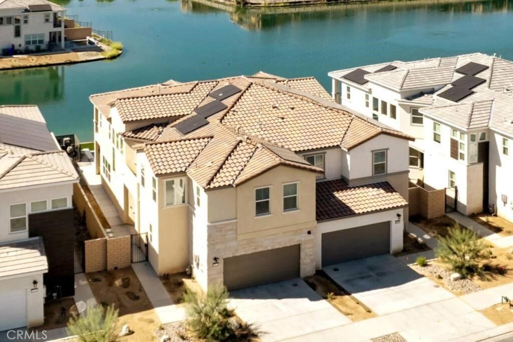 a terrace of a house with outdoor seating