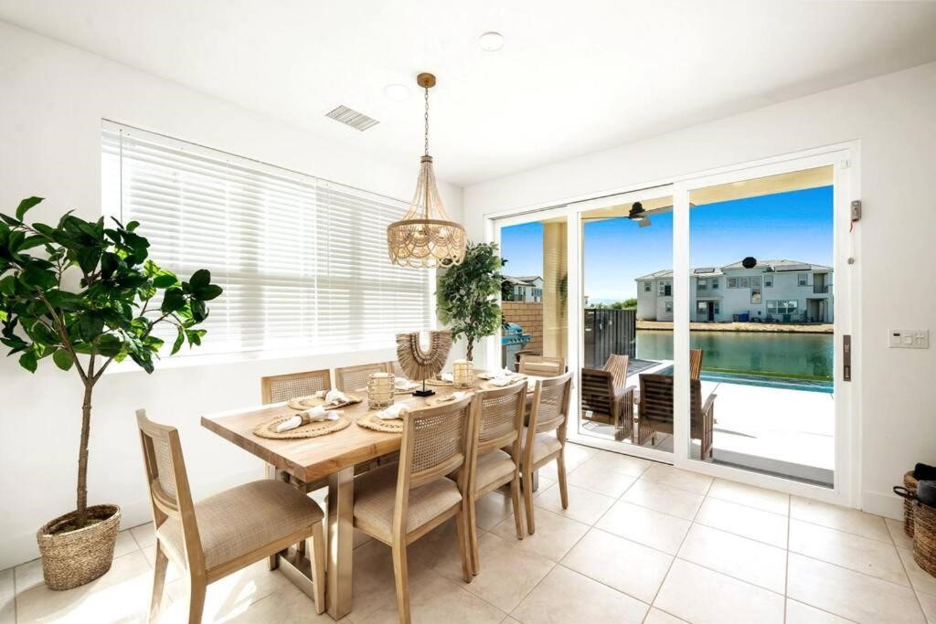 84675 Lago Brezza Indio, CA 92203 - Photo 7 of 40 a view of a dining room with furniture window and outside view