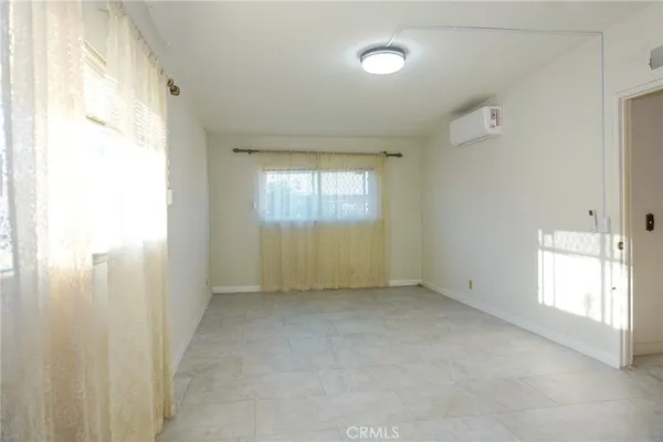 a view of a hallway with closet