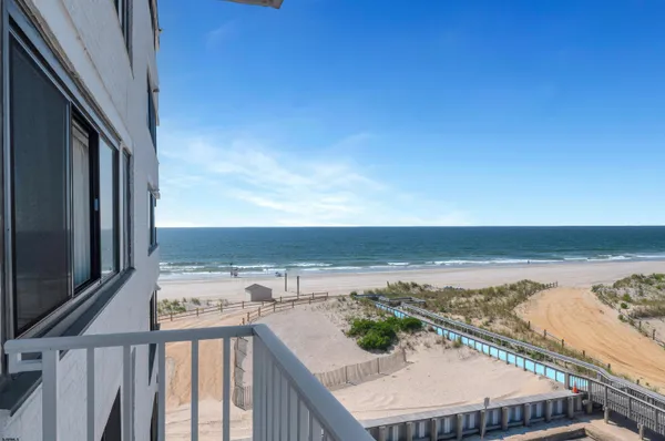 a view of a balcony with an ocean