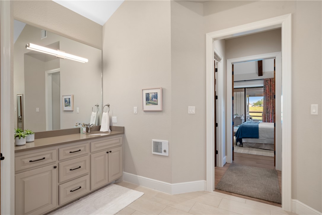 30163 High Spirit Ranch Road Hempstead, TX 77445 - Photo 28 of 49 Ensuite bathroom with vanity and tile patterned flooring