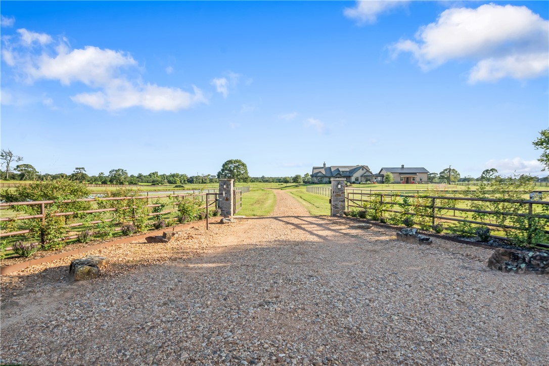 30163 High Spirit Ranch Road Hempstead, TX 77445 - Photo 4 of 49 Gate with a view of countryside