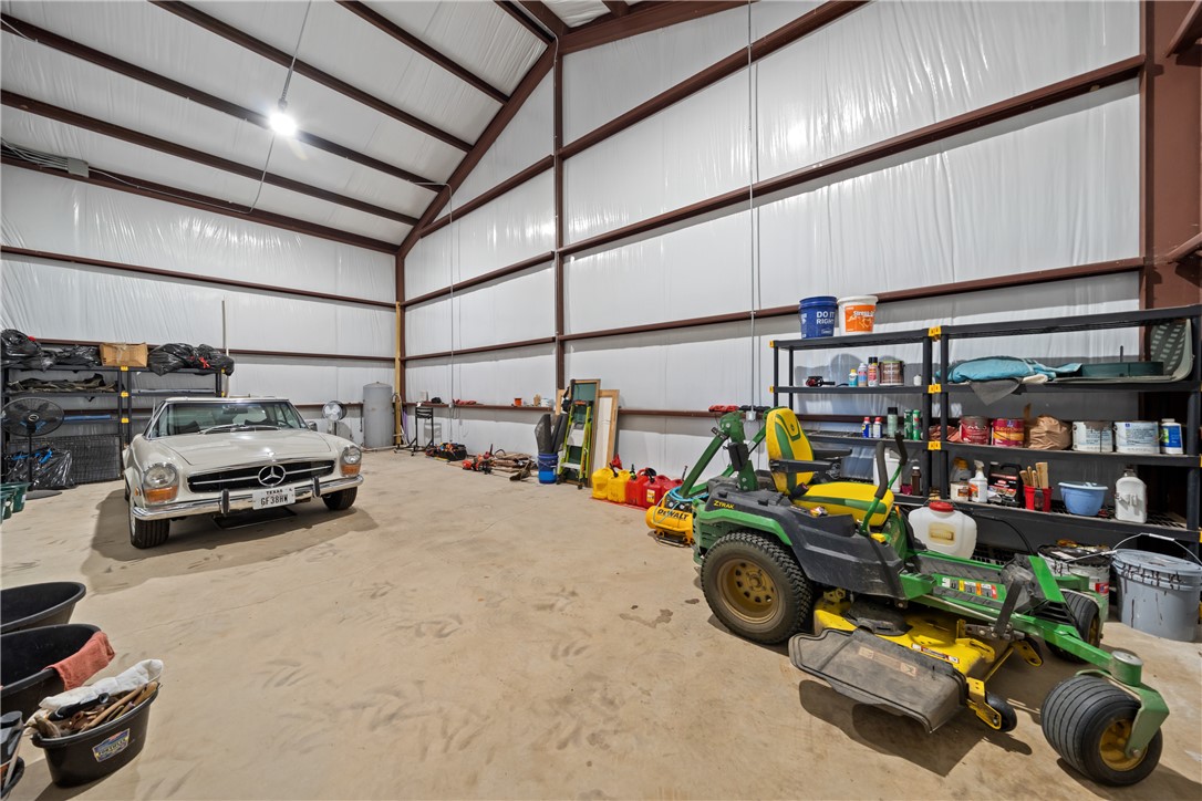 30163 High Spirit Ranch Road Hempstead, TX 77445 - Photo 49 of 49 Garage featuring metal wall