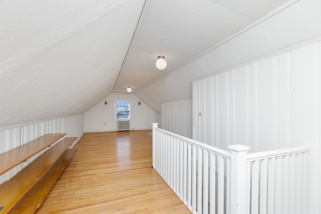 20 Rosedale Road Watertown, MA 02472 - Photo 13 of 21 a view of a hallway with wooden floor