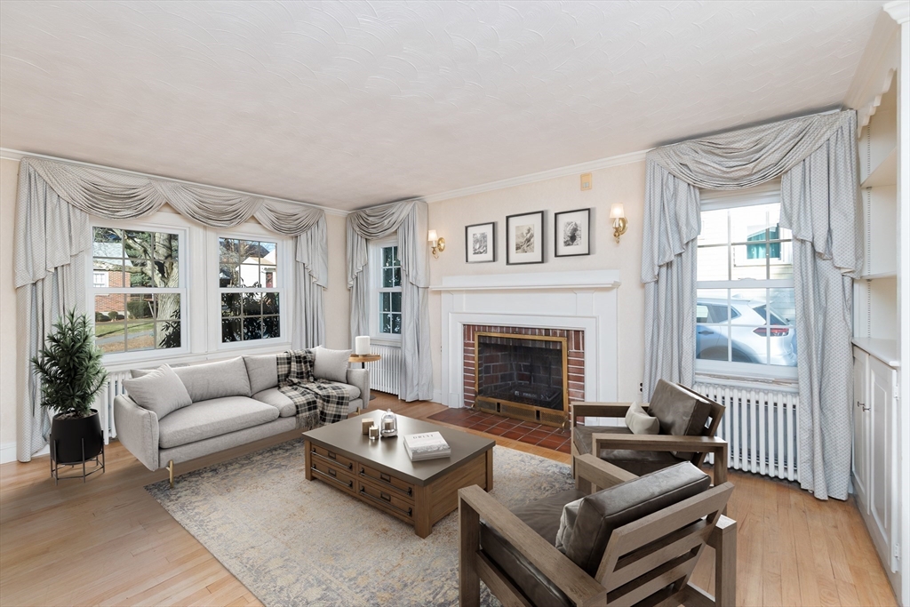 20 Rosedale Road Watertown, MA 02472 - Photo 8 of 21 a living room with furniture and a fireplace