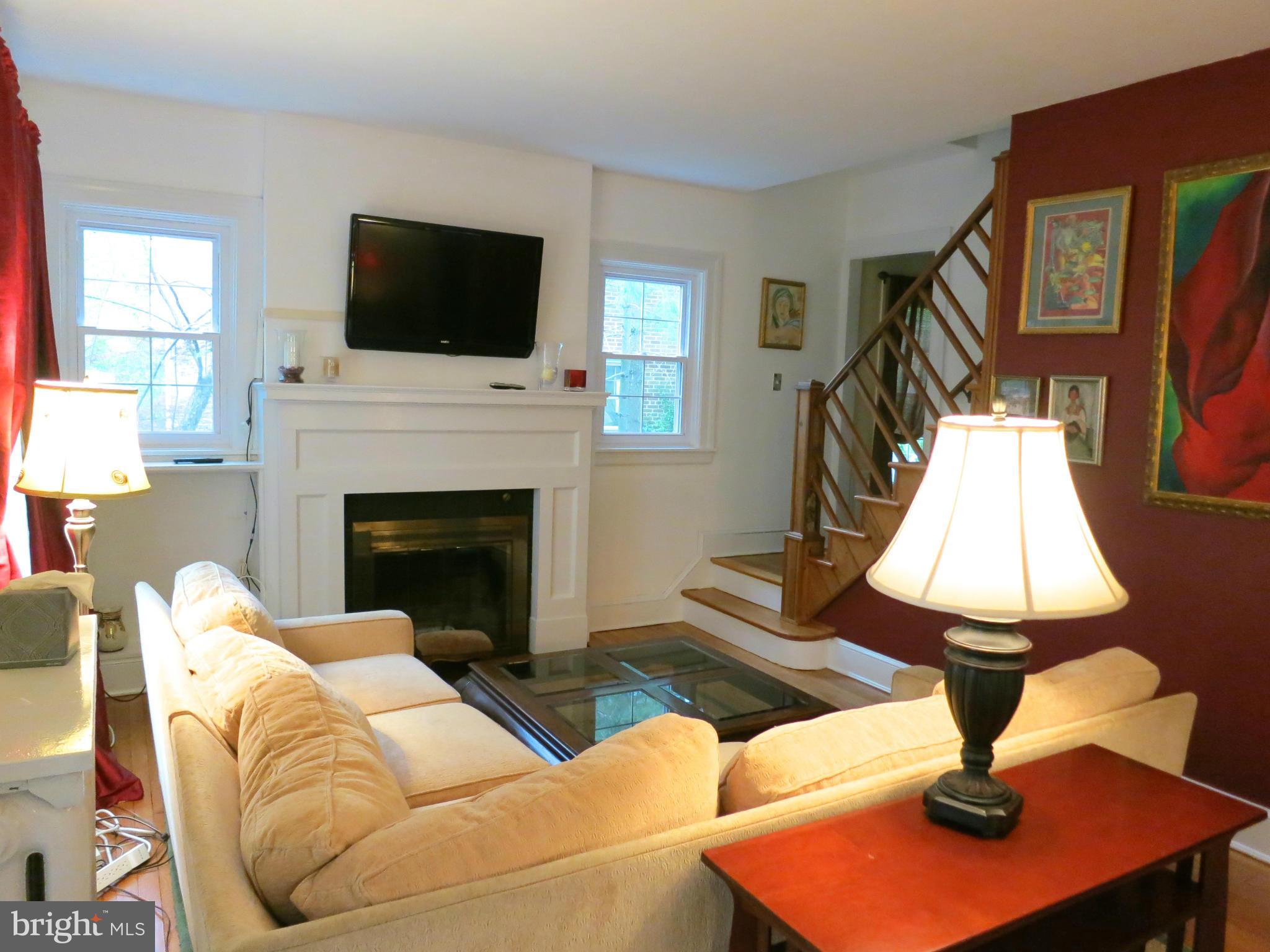 4653 Briarclift Road Baltimore, MD 21229 - Photo 2 of 30 Living Room with Wood Burning Fireplace