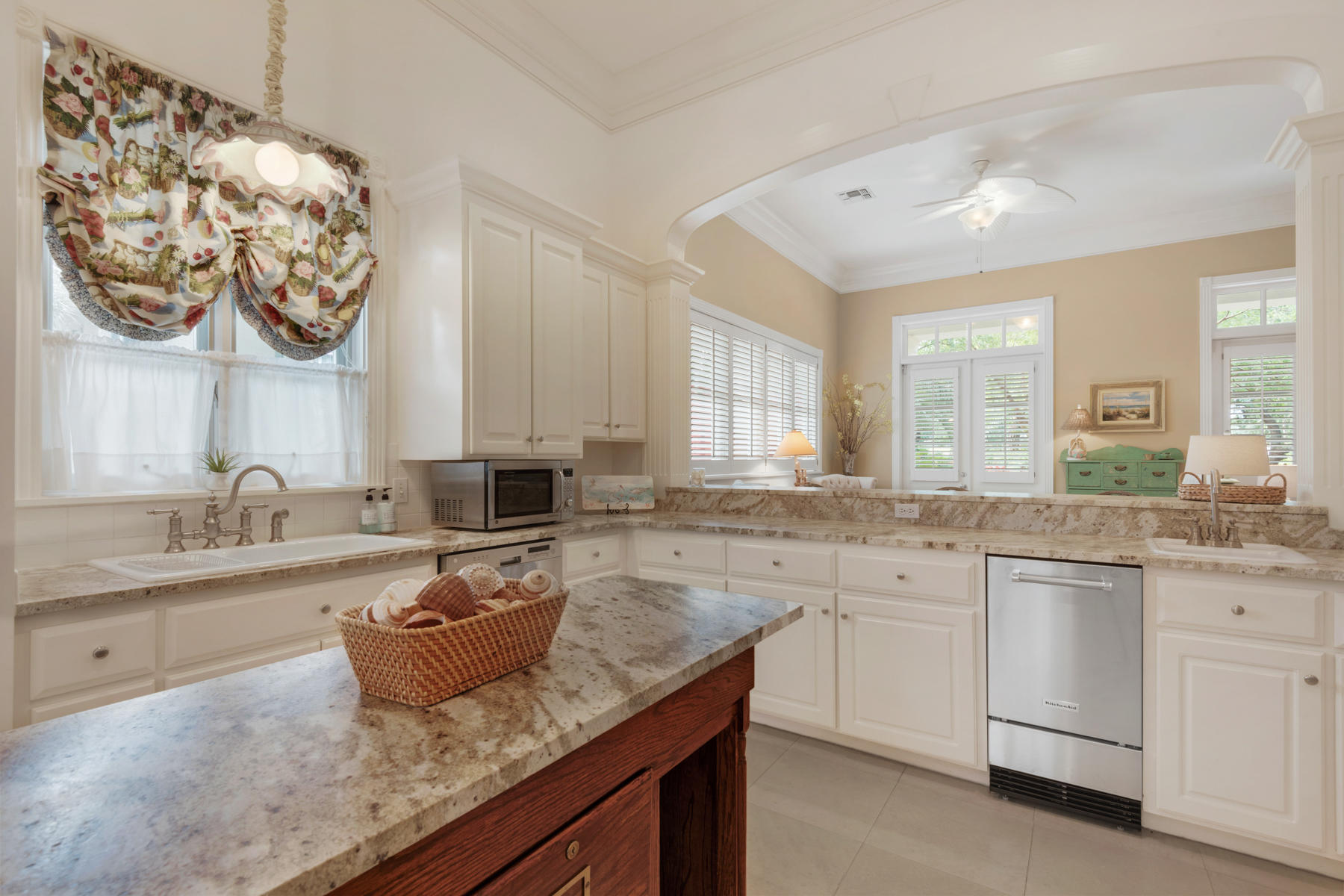12 Place De La Fontaine Miramar Beach, FL 32550 - Photo 17 of 59 a kitchen with sink stove and cabinets