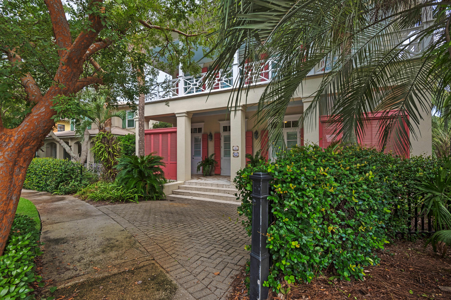 12 Place De La Fontaine Miramar Beach, FL 32550 - Photo 2 of 59 front view of a house with a yard