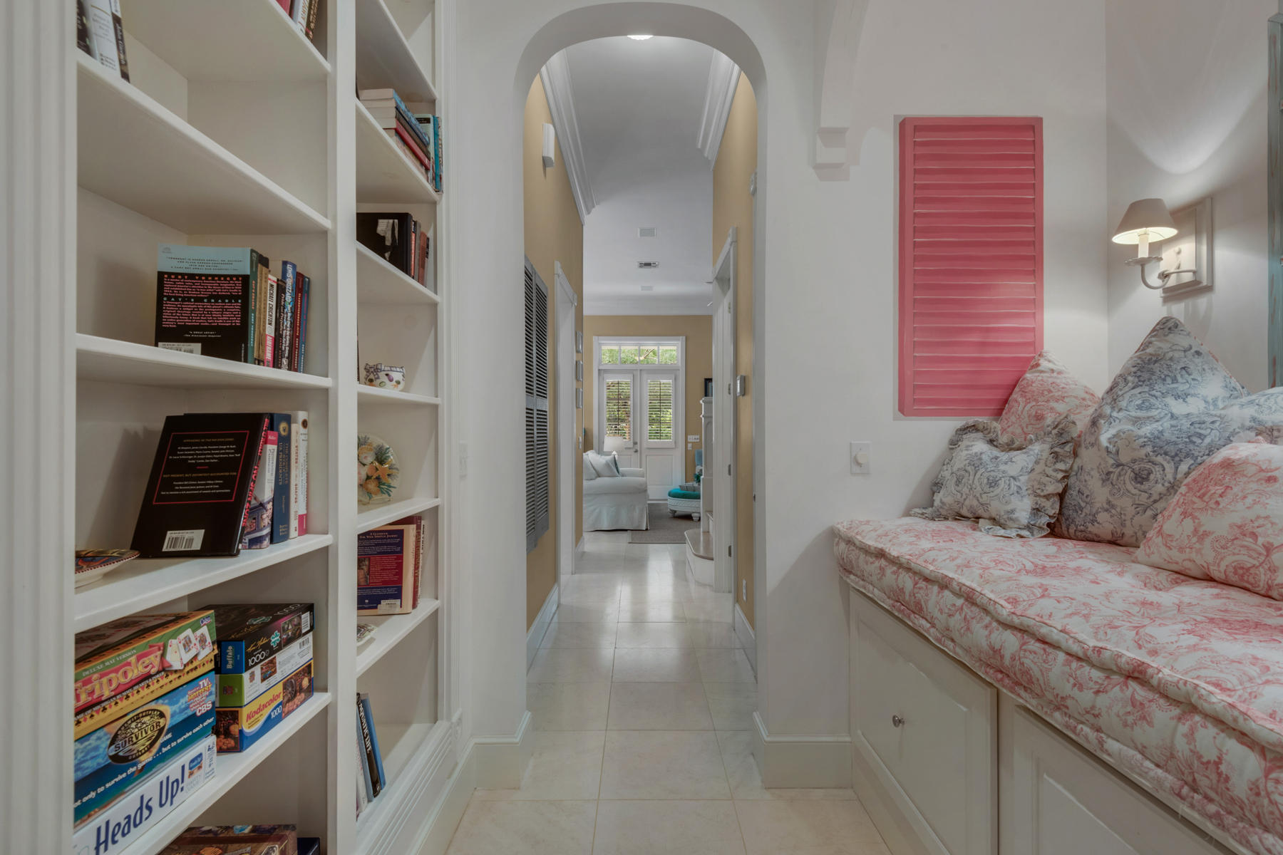 12 Place De La Fontaine Miramar Beach, FL 32550 - Photo 26 of 59 a living room with furniture and a book shelf