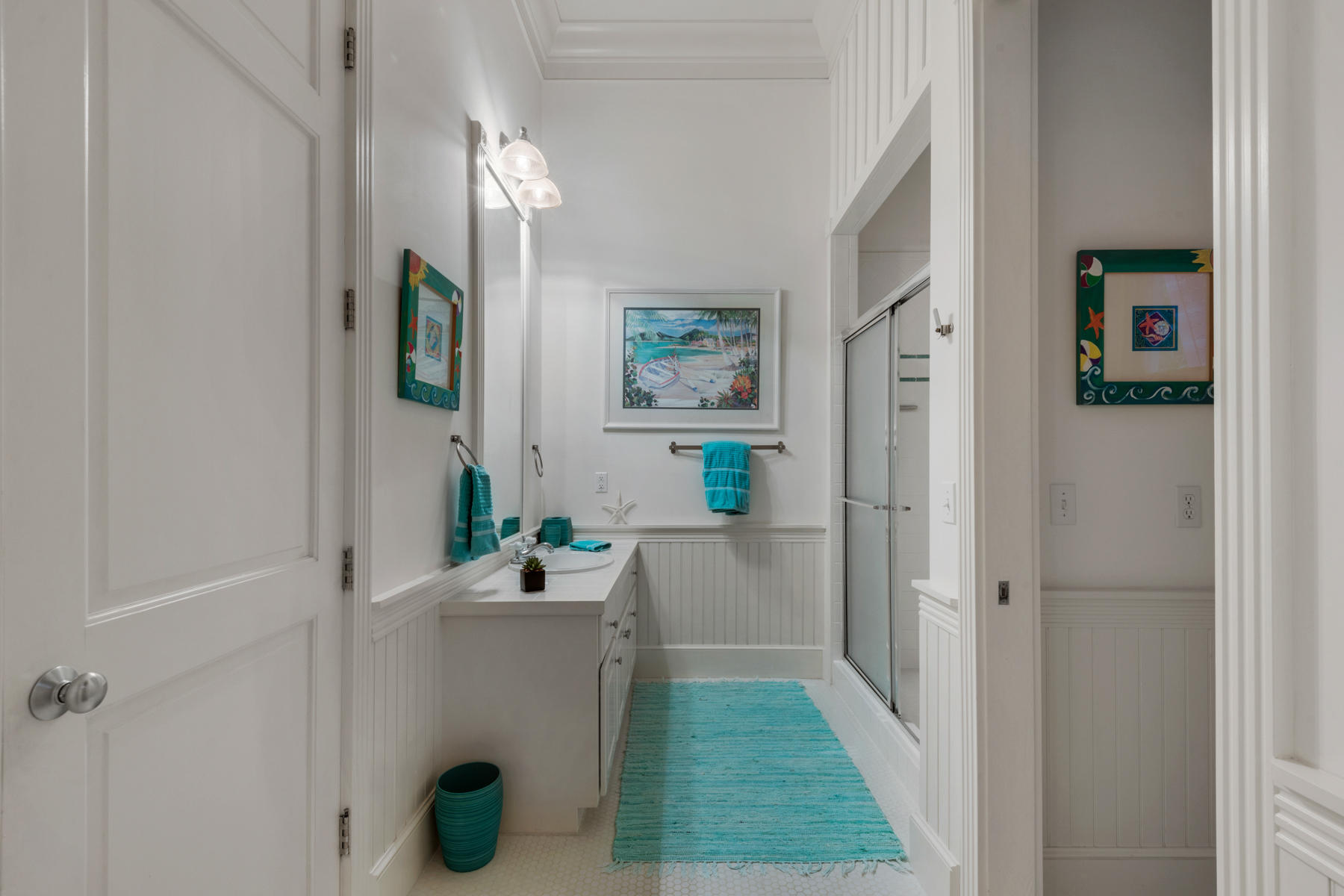 12 Place De La Fontaine Miramar Beach, FL 32550 - Photo 29 of 59 a bathroom with a sink a mirror and window