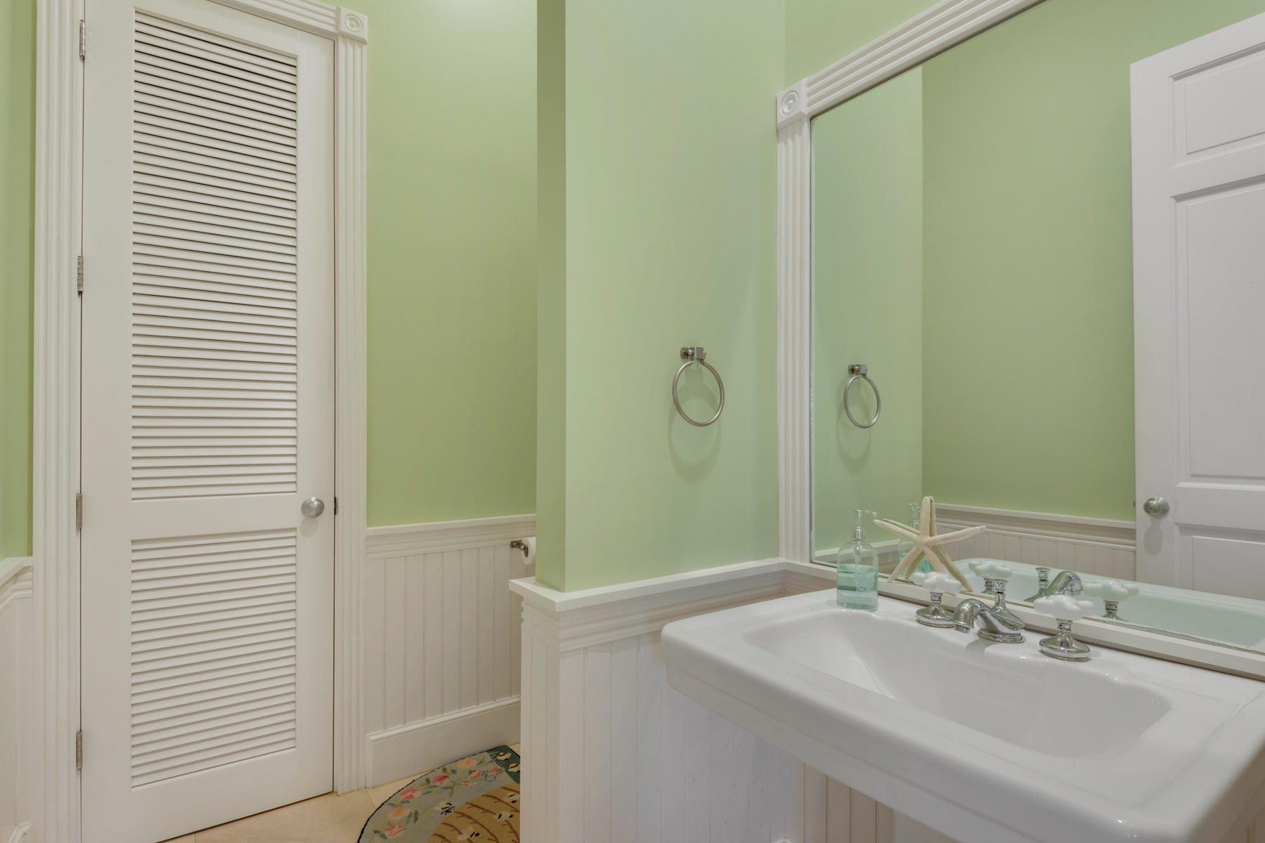 12 Place De La Fontaine Miramar Beach, FL 32550 - Photo 32 of 59 a bathroom with a sink and a mirror