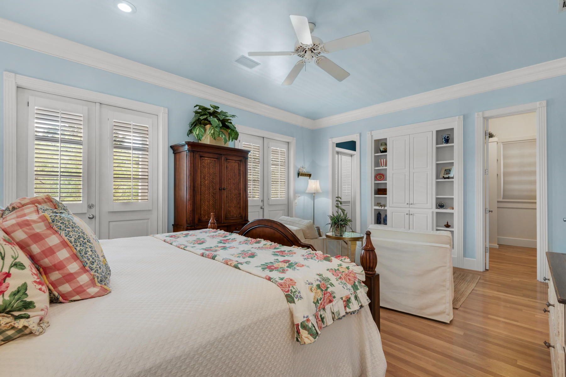 12 Place De La Fontaine Miramar Beach, FL 32550 - Photo 35 of 59 a bedroom with a bed closet and wooden floor