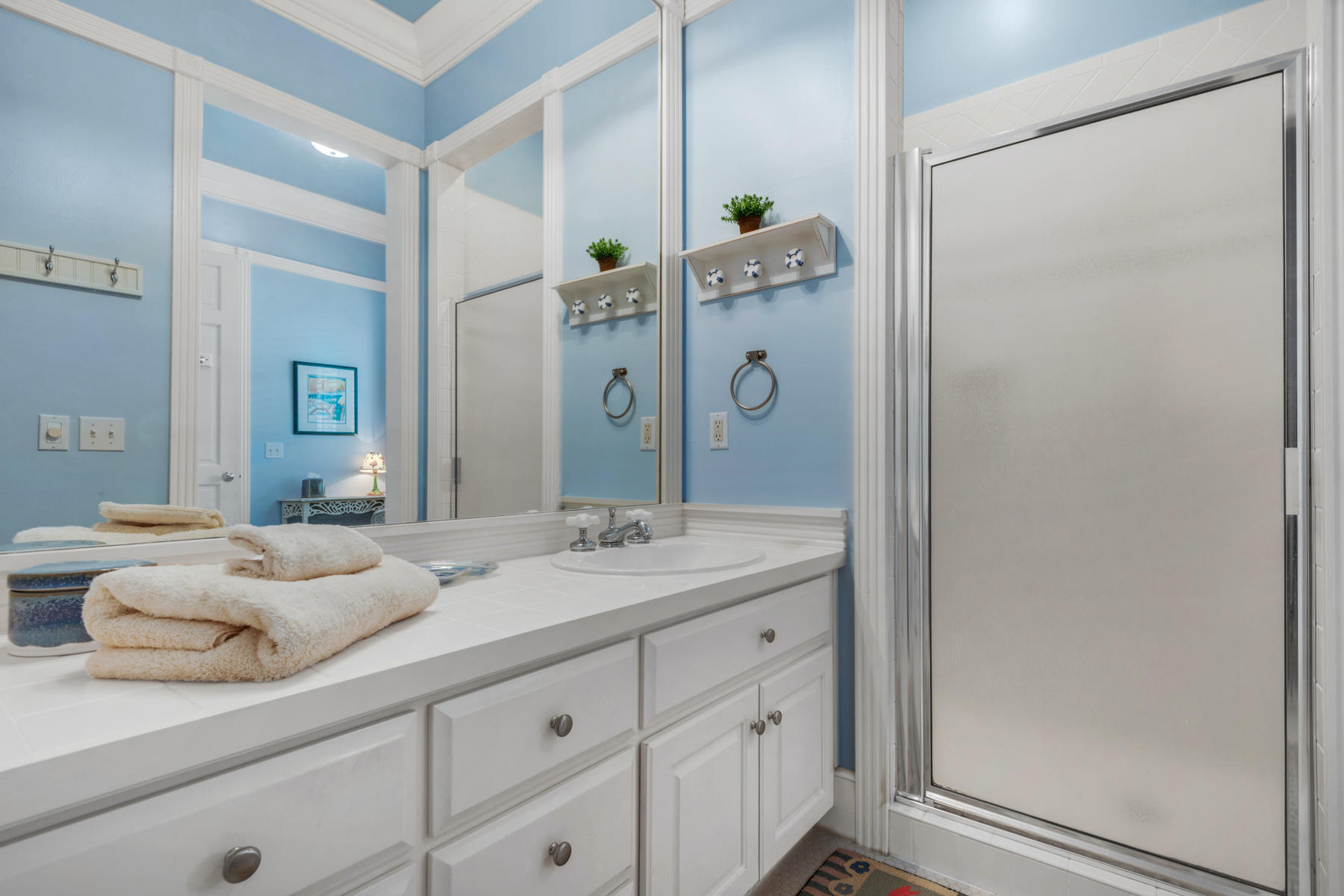 12 Place De La Fontaine Miramar Beach, FL 32550 - Photo 40 of 59 a bathroom with a granite countertop sink and a mirror