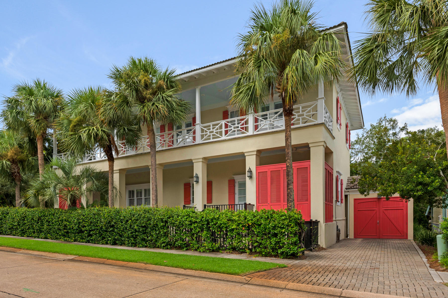12 Place De La Fontaine Miramar Beach, FL 32550 - Photo 4 of 59 front view of a house with a yard and potted plants