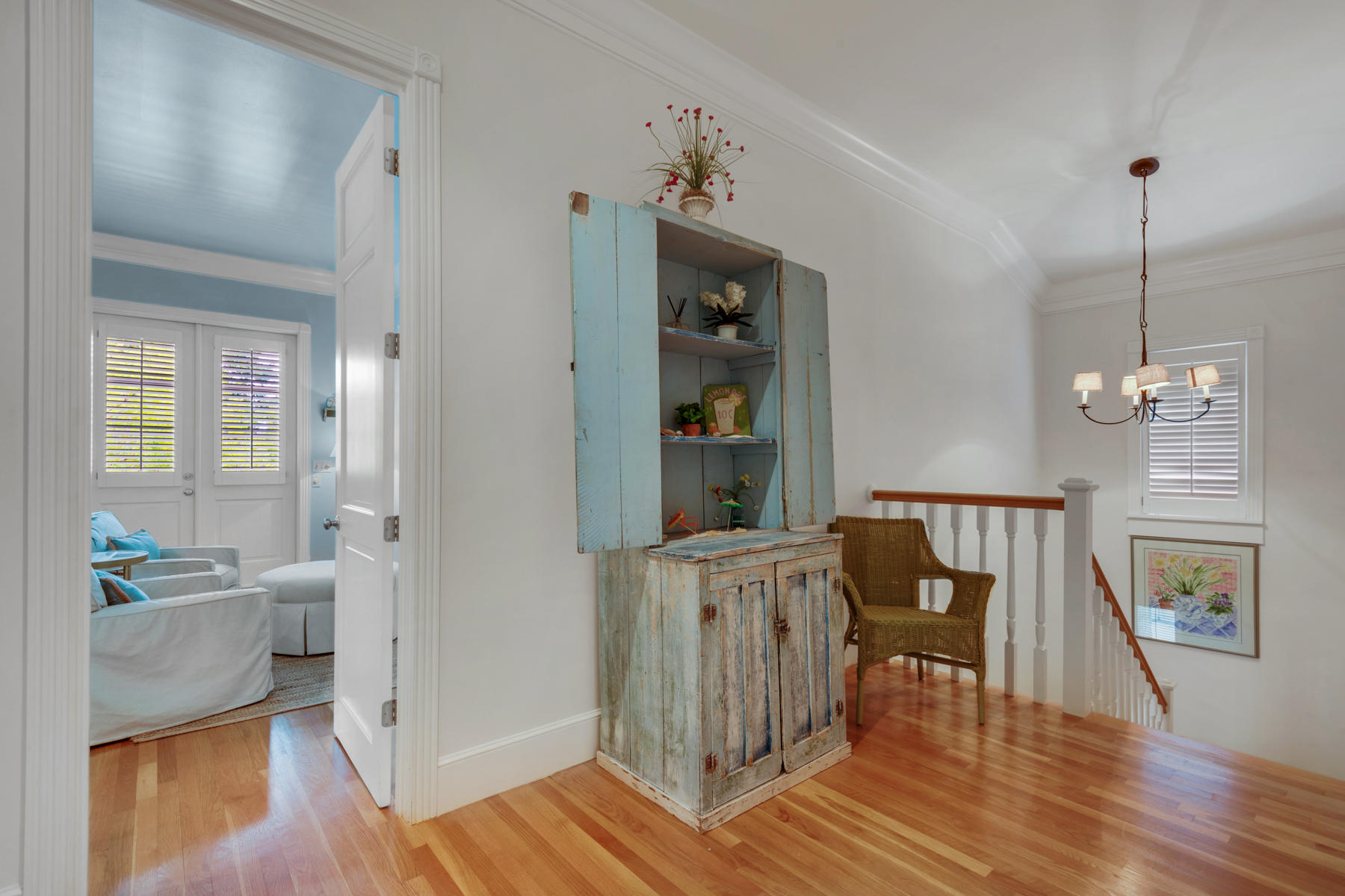 12 Place De La Fontaine Miramar Beach, FL 32550 - Photo 43 of 59 a view of a livingroom with furniture wooden floor and a chandelier