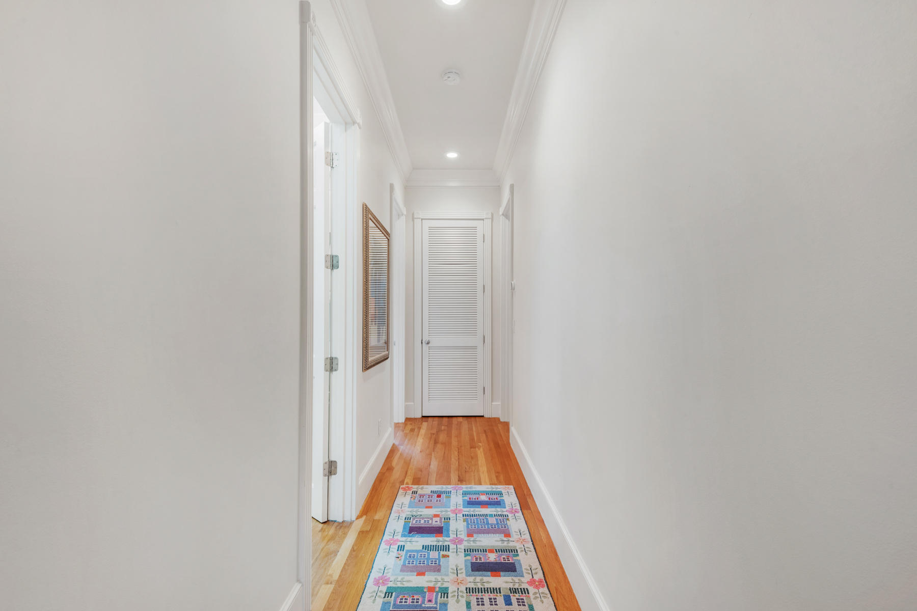 12 Place De La Fontaine Miramar Beach, FL 32550 - Photo 44 of 59 a view of hallway with wooden floor