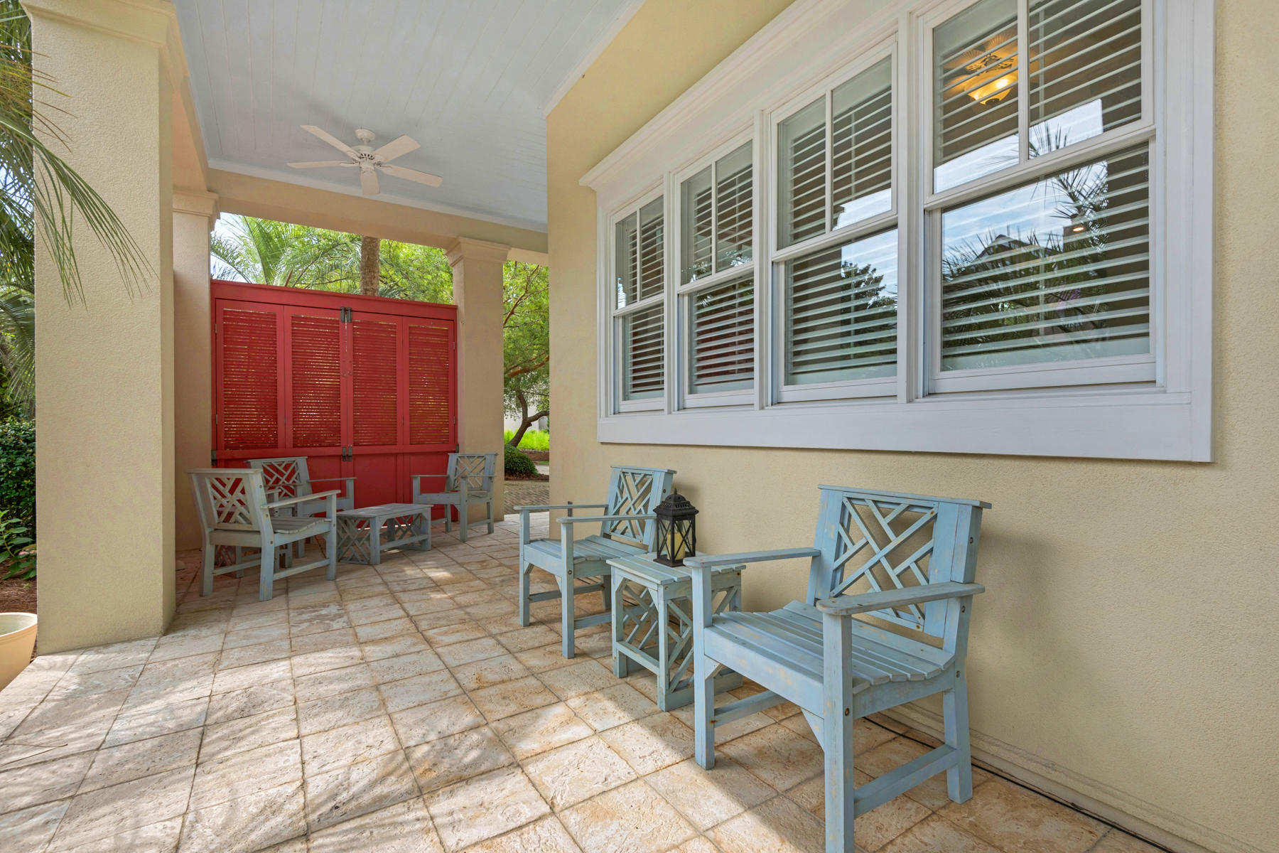 12 Place De La Fontaine Miramar Beach, FL 32550 - Photo 45 of 59 a view of a chairs and table in the back yard of the house