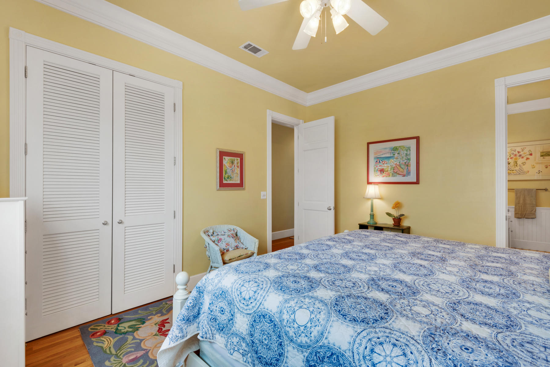 12 Place De La Fontaine Miramar Beach, FL 32550 - Photo 47 of 59 a bedroom with a bed and a chandelier