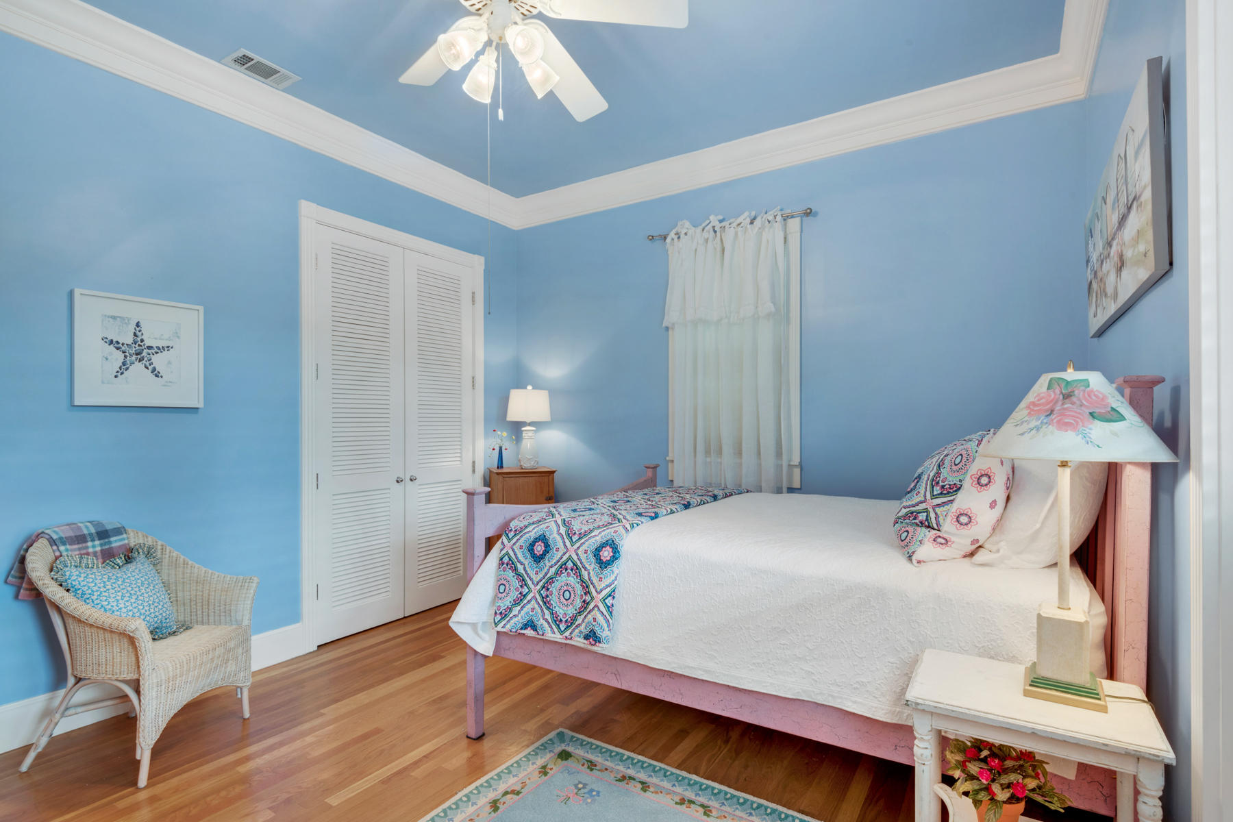 12 Place De La Fontaine Miramar Beach, FL 32550 - Photo 51 of 59 a bedroom with a bed and a chair