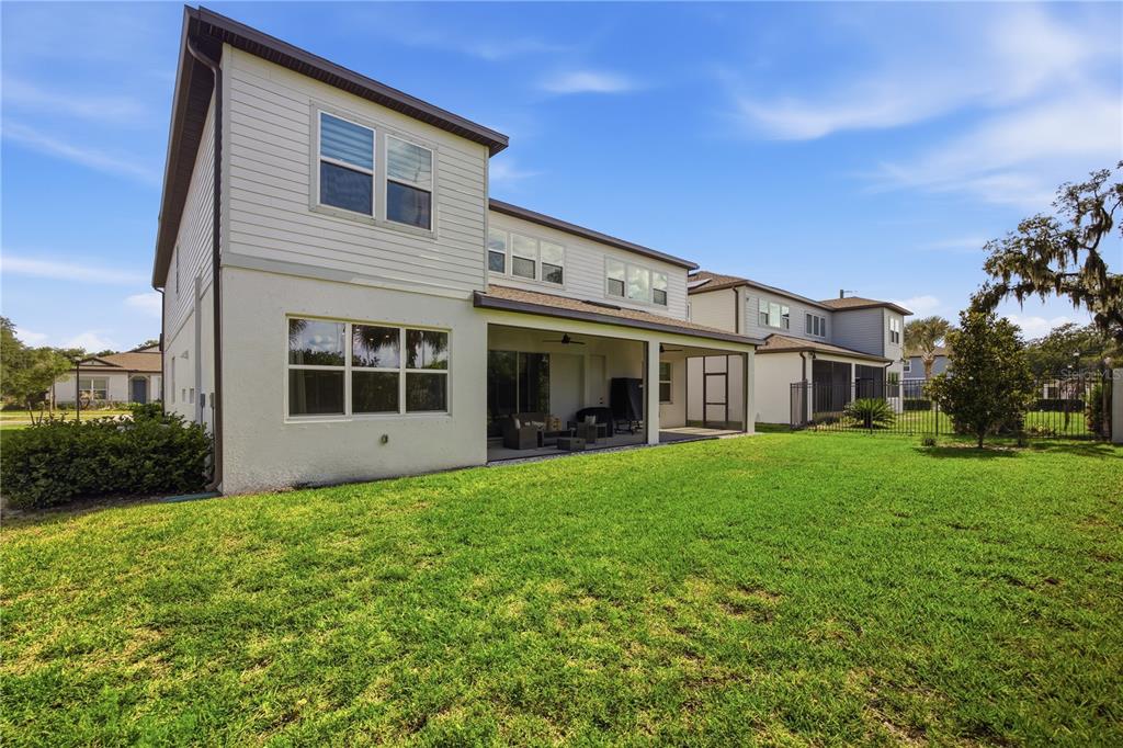 13816 Sharp Hawk Drive Riverview, FL 33569 - Photo 65 of 76 a front view of a house with a garden