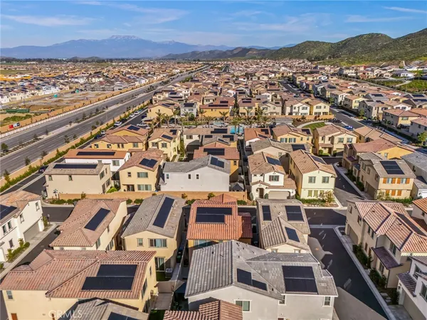 a view of an ocean with a city view