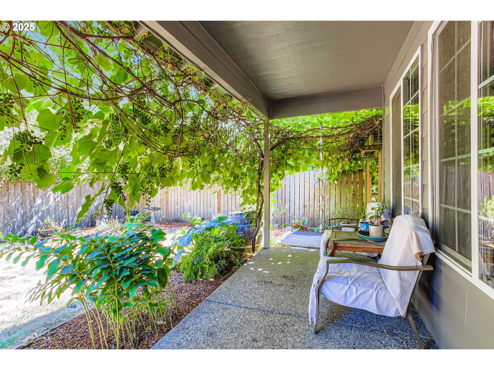 1144 Southwest Ivory Loop, Unit 35 Gresham, OR 97080 - Photo 3 of 28 a view of an outdoor sitting area
