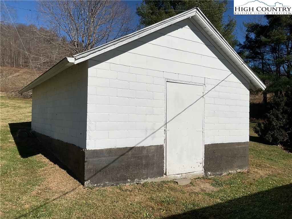 4560 Highway 18 Sparta, NC 28675 - Photo 12 of 43 a view of a house with a yard