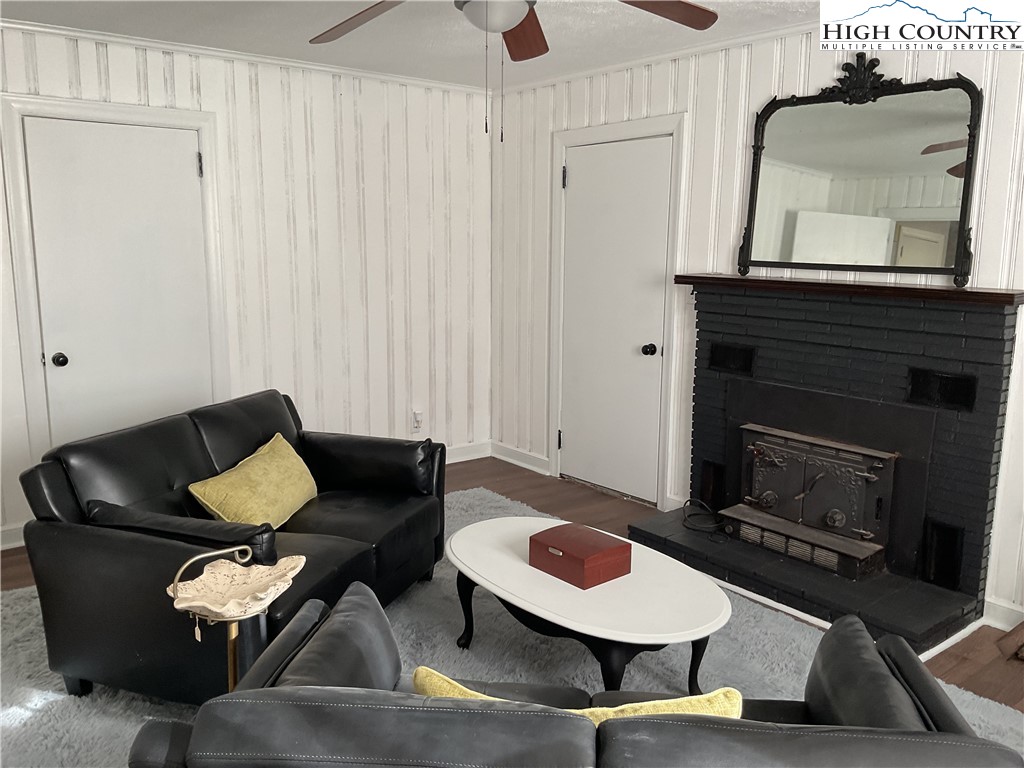 4560 Highway 18 Sparta, NC 28675 - Photo 34 of 43 a living room with furniture and a mirror