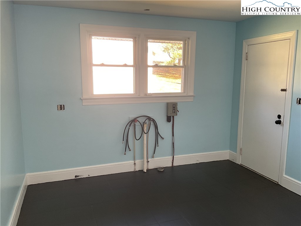 4560 Highway 18 Sparta, NC 28675 - Photo 38 of 43 a view of a small space with wooden floor and a window