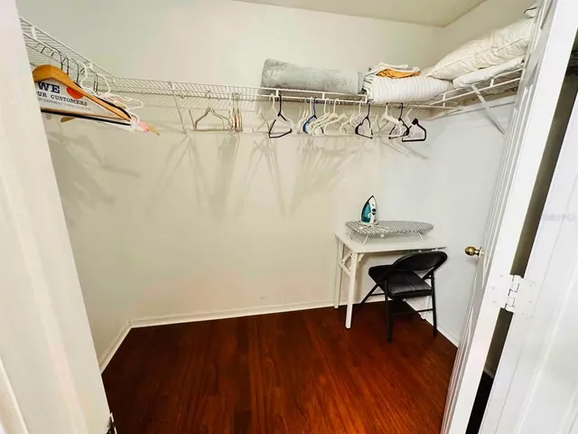 a view of a room with racks on the wall