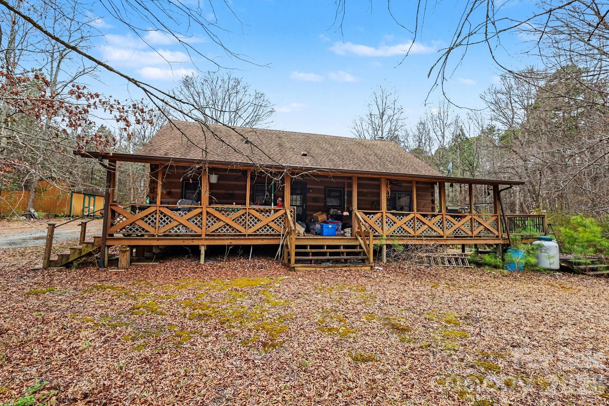 10217 Bethel Church Road Midland, NC 28107 - Photo 4 of 18 a view of a house with a patio and a yard