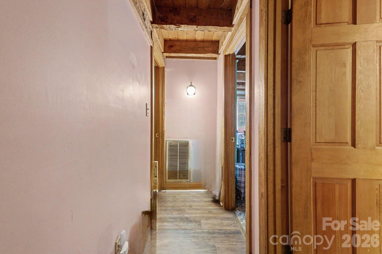 10217 Bethel Church Road Midland, NC 28107 - Photo 6 of 18 a view of a hallway with wooden door