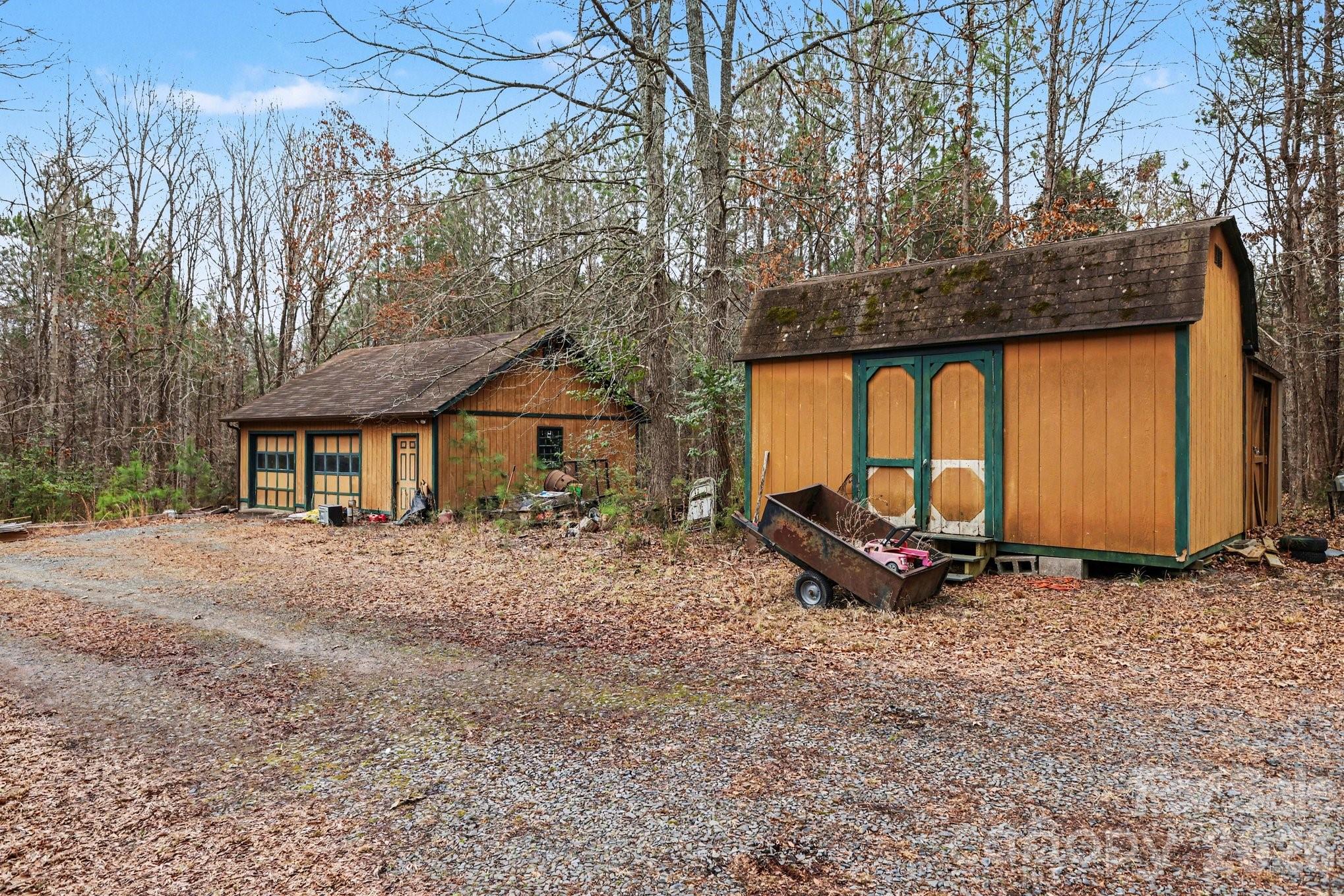 10217 Bethel Church Road Midland, NC 28107 - Photo 9 of 18 a view of a house with backyard and trees