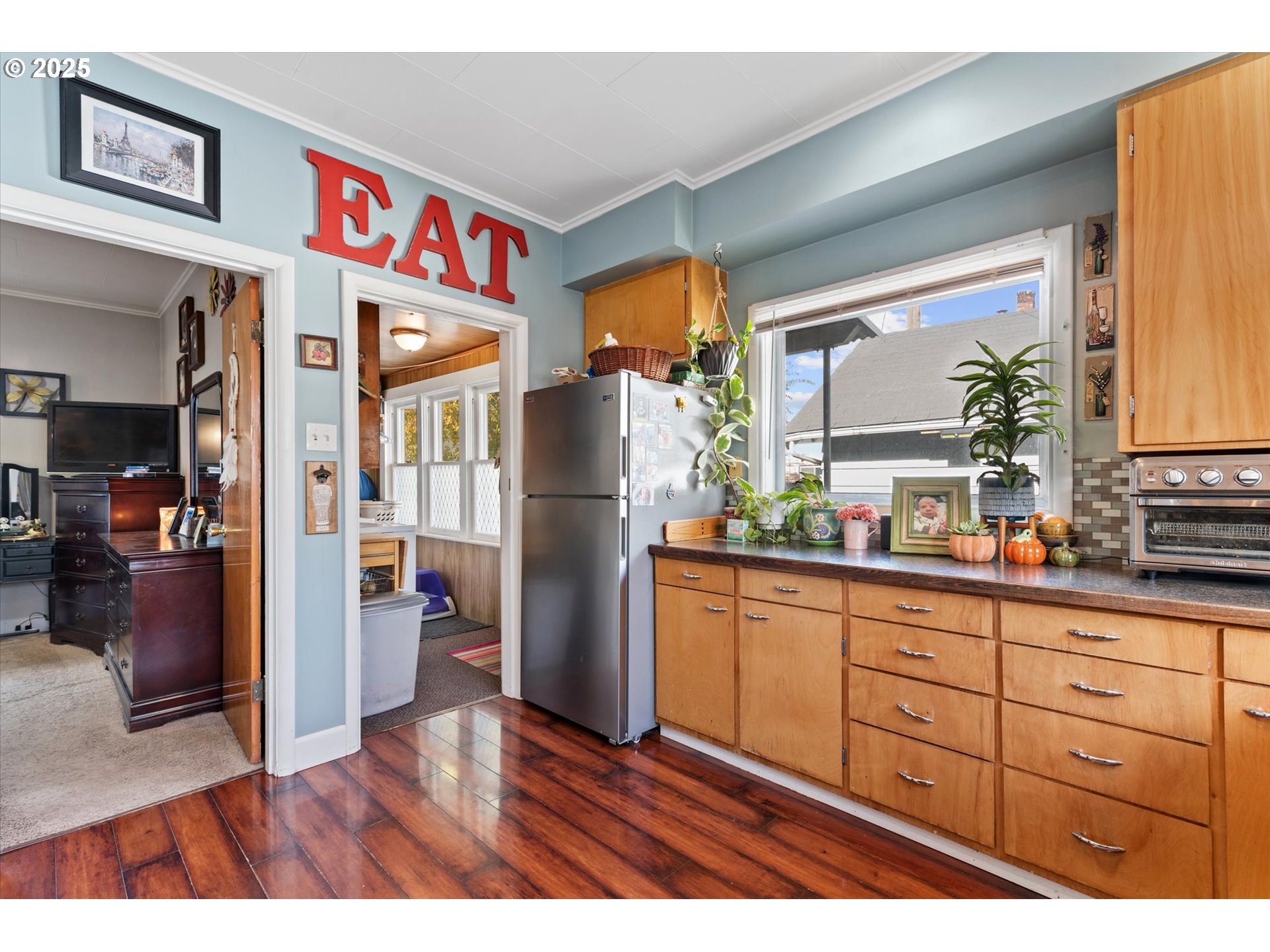 1410 Valley Avenue Baker City, OR 97814 - Photo 11 of 28 a open kitchen with stainless steel appliances granite countertop a refrigerator and a sink