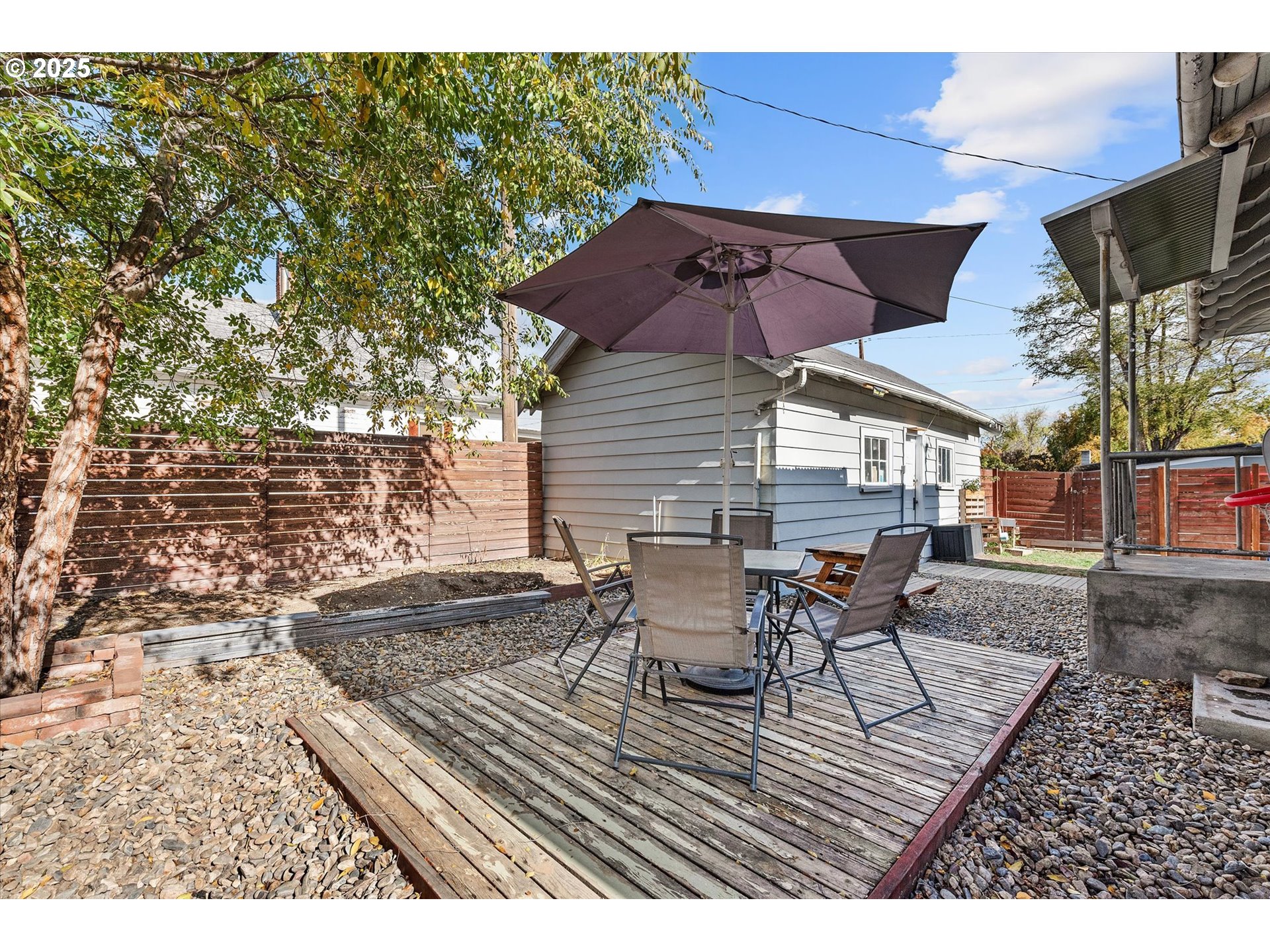 1410 Valley Avenue Baker City, OR 97814 - Photo 27 of 28 a view of a chairs and table on the deck